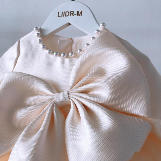 Ivory pearl tulle frock with bow, photo 2 of 3
