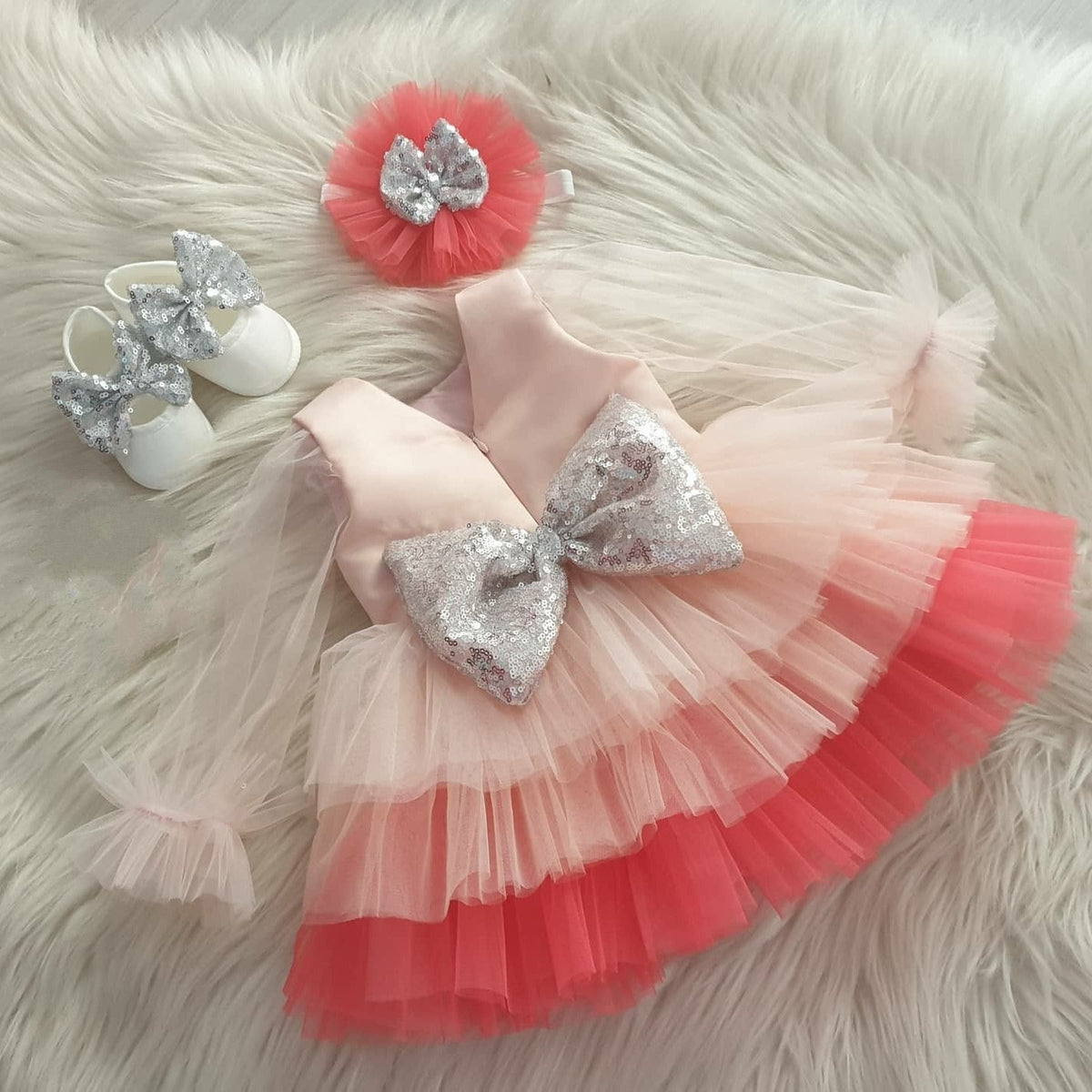 Peach ombré tulle frock with sequin bow for a baby girl