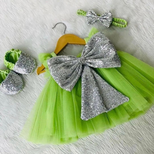 Green tulle frock with silver sequin bow, photo 2 of 3