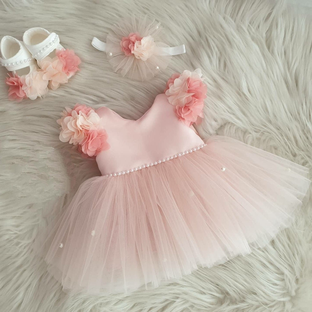 Peach blossom tulle frock for a baby girl