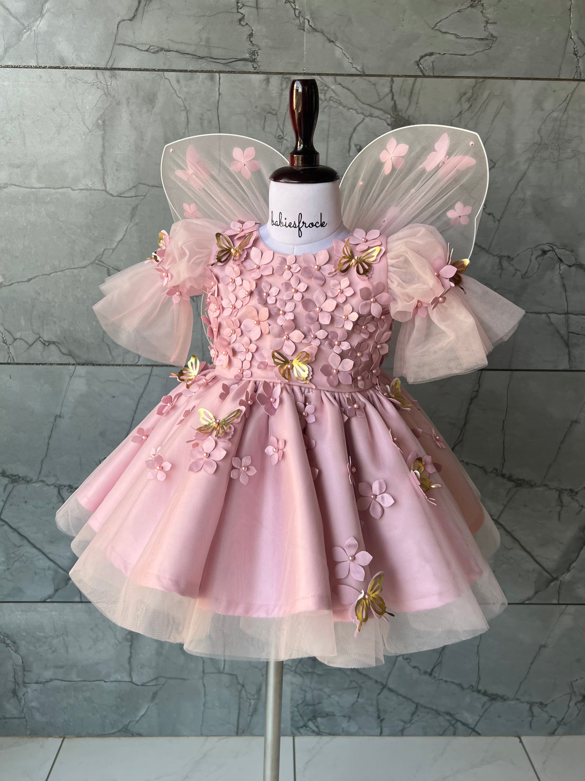 Onion pink butterfly frock for a baby girl