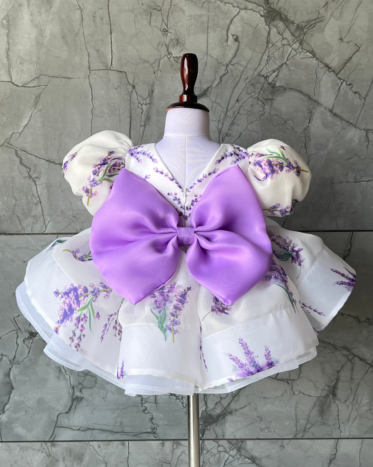 Lavender print organza frock with bow for a baby girl