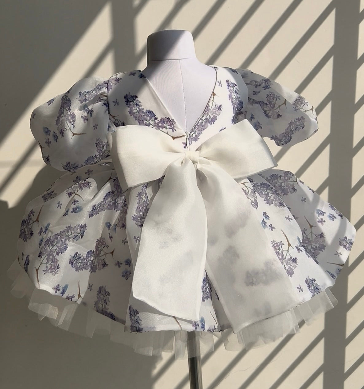 Lilac print organza frock with bow for a baby girl