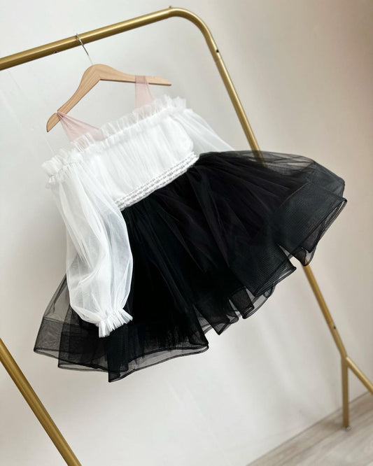 Black tulle frock with white top for a baby girl