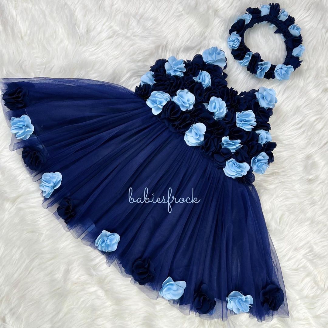 Navy tulle frock with blue flowers for a baby girl