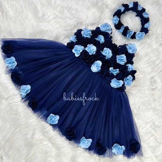 Navy tulle frock with blue flowers for a baby girl