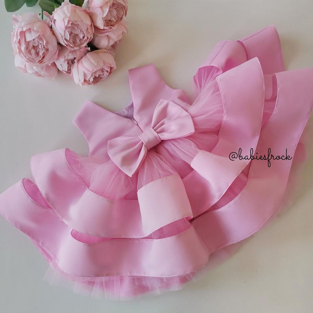 Rose pink layered satin frock for a baby girl