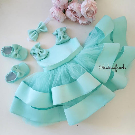 Mint layered satin frock for a baby girl