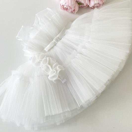 White tulle frock for a baby girl