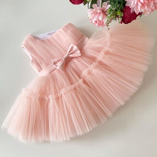 Peach one-shoulder tulle frock for a baby girl