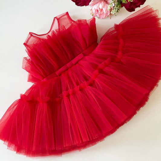 Red layered tulle frock for a baby girl