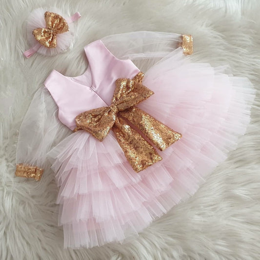Pink tulle frock with gold sequin bodice for a baby girl