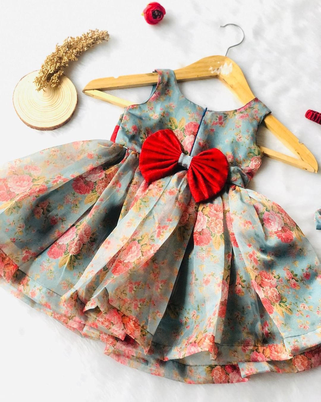 Teal floral print organza frock for a baby girl
