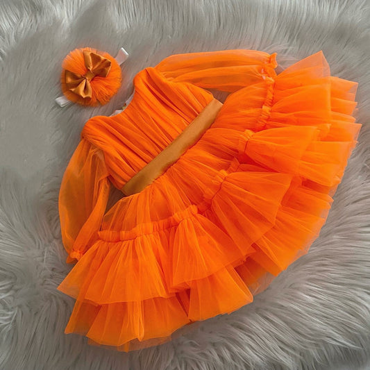 Orange tulle frock for a baby girl