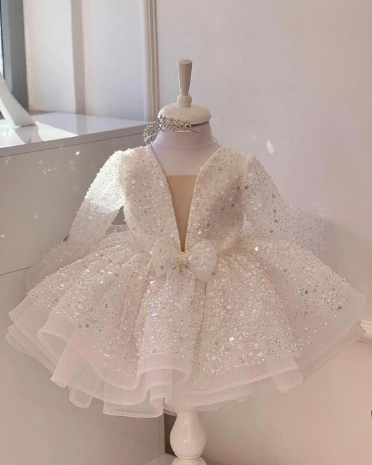 Ivory sequin gown for a baby girl