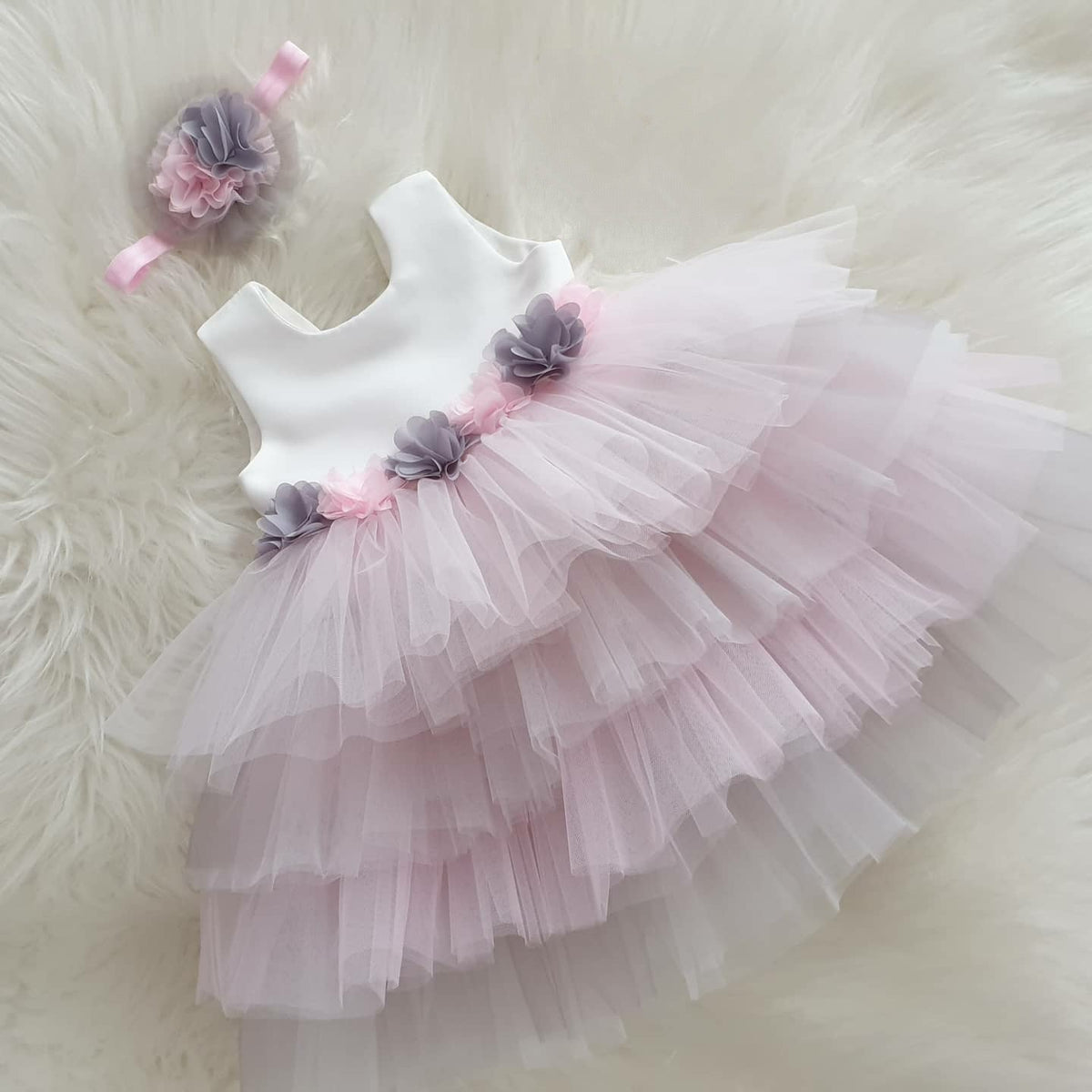 White layered tulle frock with grey flower for a baby girl