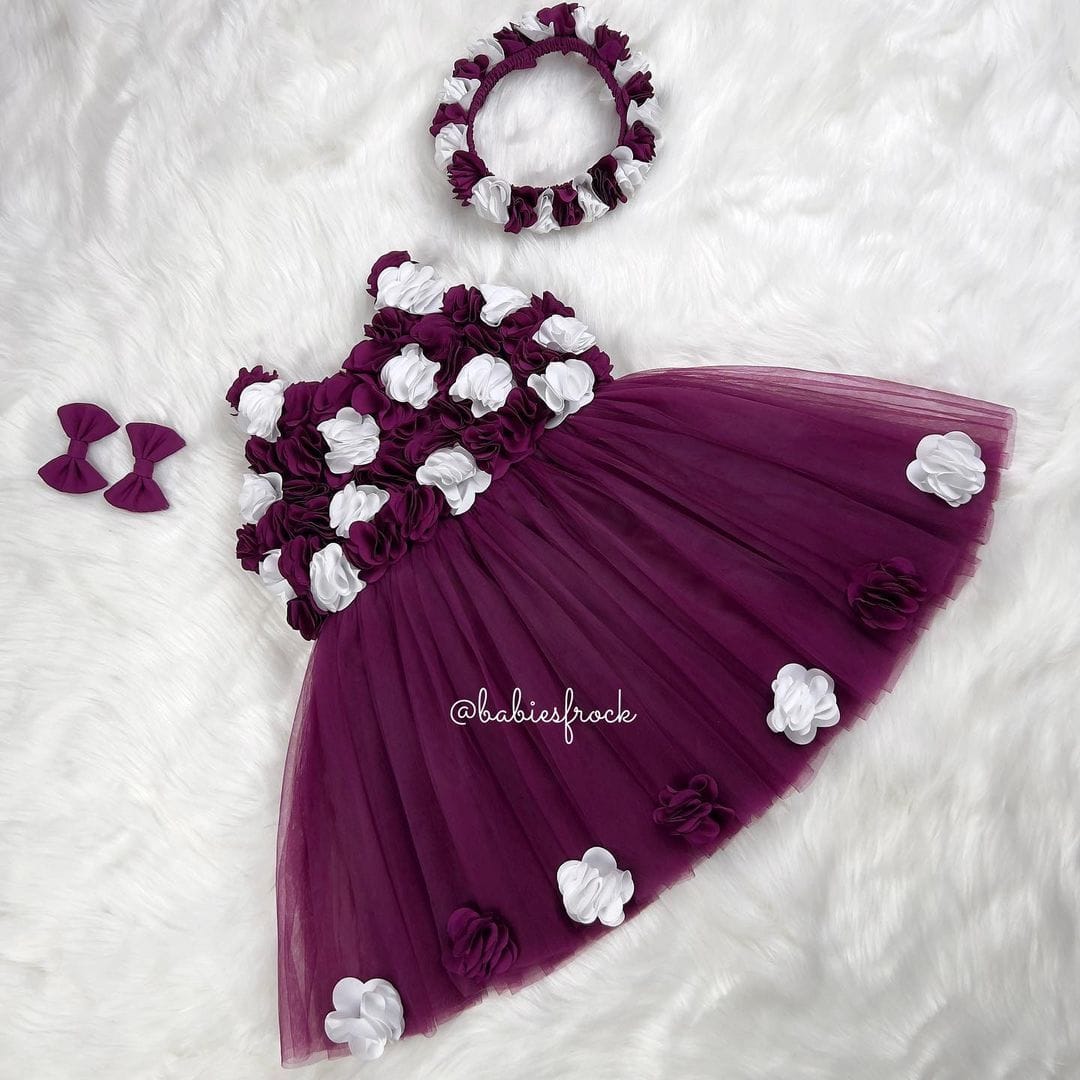 Plum tulle frock with white flowers for a baby girl
