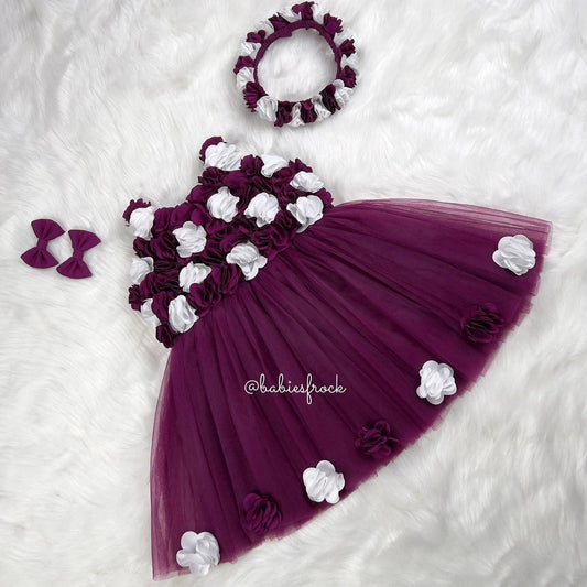 Plum tulle frock with white flowers for a baby girl