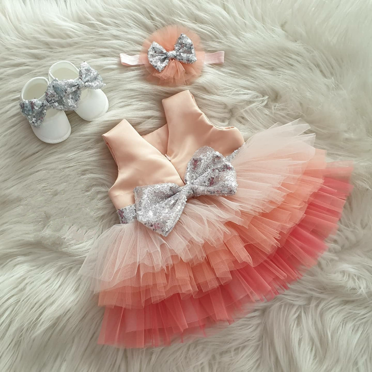 Coral ombré tulle frock with sequin bow for a baby girl