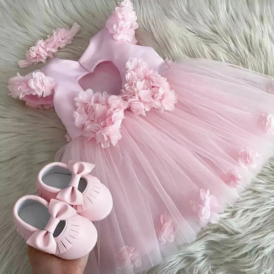 Pink blossom tulle frock for a baby girl