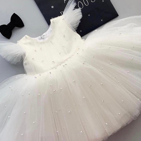 White pearl tulle frock for a baby girl